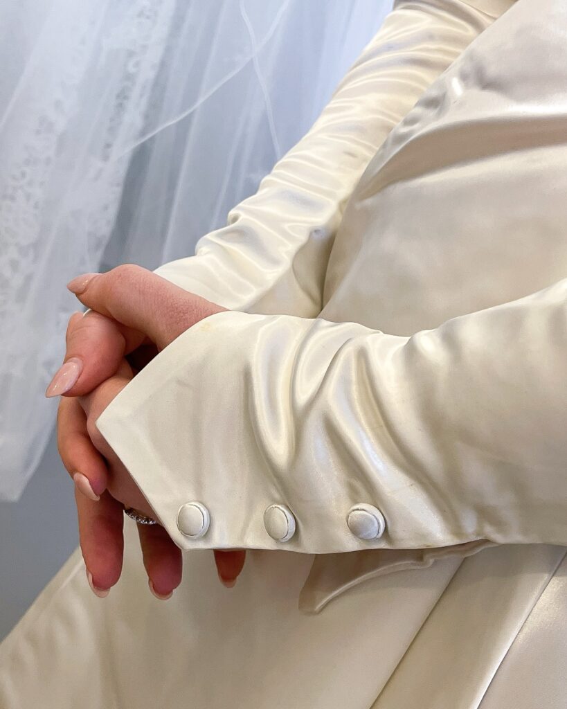 Original pointed cuff with covered buttons on Fiona’s mum’s wedding dress